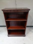 A set of open bookshelves in a mahogany finish CONDITION REPORT: 64cm wide by 30cm