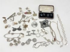 A collection of silver jewellery, chains, rings,