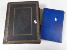 A leather bound 19th century family bible with colour book plates and one further bible