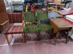 A continental oak drop leaf trolley together with three further continental oak dining chairs in