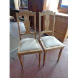 A set of four early 20th century dining chairs