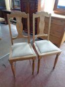A set of four early 20th century dining chairs