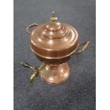 An antique copper and brass samovar