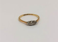 An 18ct gold diamond set ring, size N CONDITION REPORT: 1.