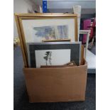 A box of miscellaneous pictures, hot plate,