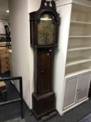 A 19th century oak cased longcase clock with brass dial signed Johnson, Rothbury,