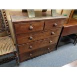 A Victorian pine five drawer chest with knob handles