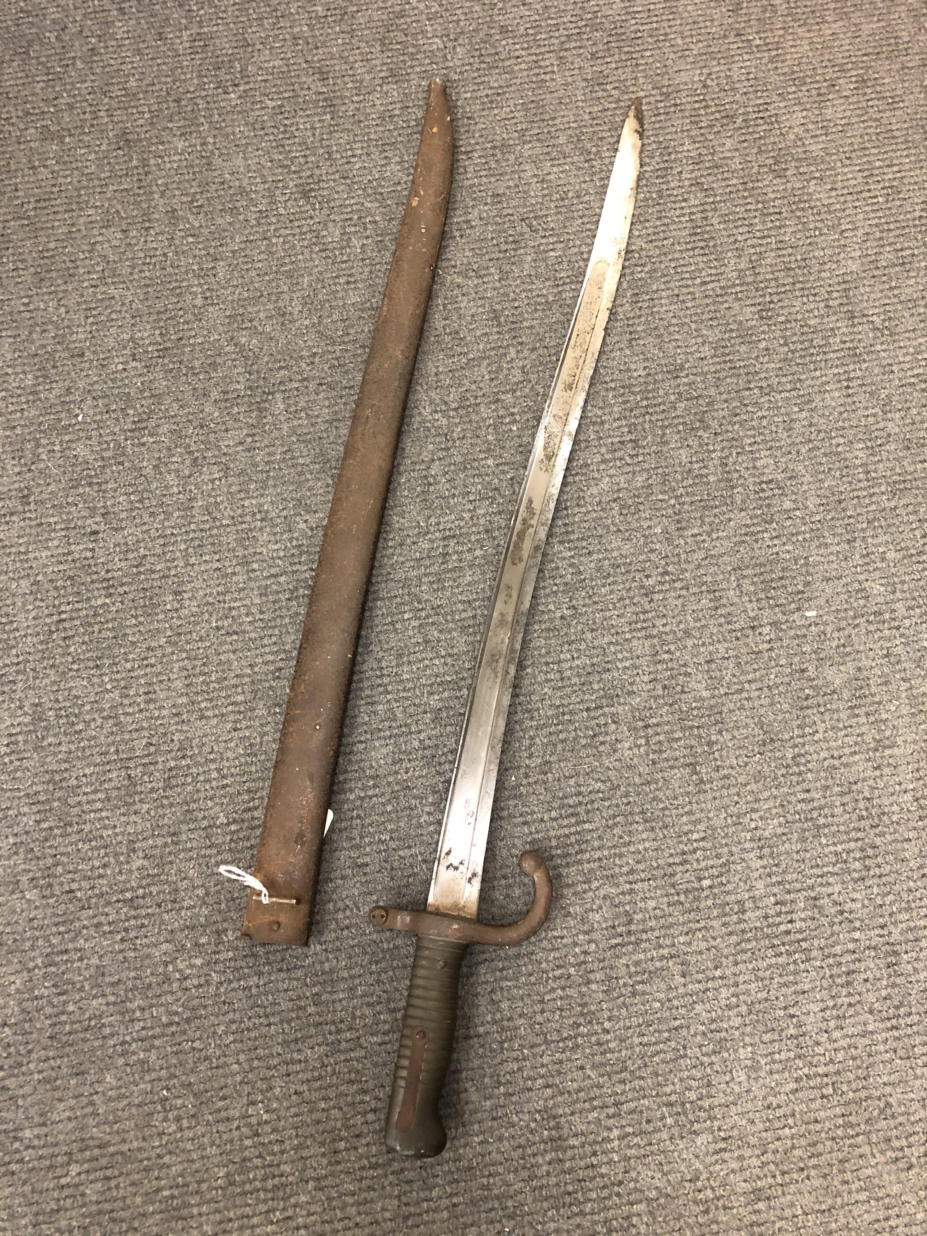 A French 1866 Chassepot bayonet in scabbard