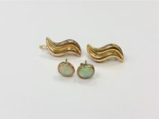 A pair of 9ct gold earrings, 6.6g, together with a pair of opal earrings in yellow gold, 1.6g.