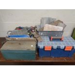 A metal concertina tool box and plastic tool box,