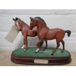 A Royal Doulton horse group Spirit of Love on wooden plinth