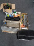 A box of assorted tools, paint sprayer,