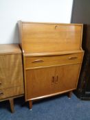 A mid 20th century teak writing bureau