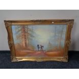 A gilt framed oil on canvas, huntsman on horse with hounds,