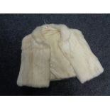 A lady's mink cape / jacket CONDITION REPORT: This is in good condition,