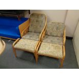 Two bamboo and wicker armchairs together with two similar footstools