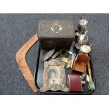 A tray of miscellany to include plated trophies, antique embossed tin, boomerang, hip flask,