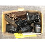 A box of cameras including Nikon, Kodak,