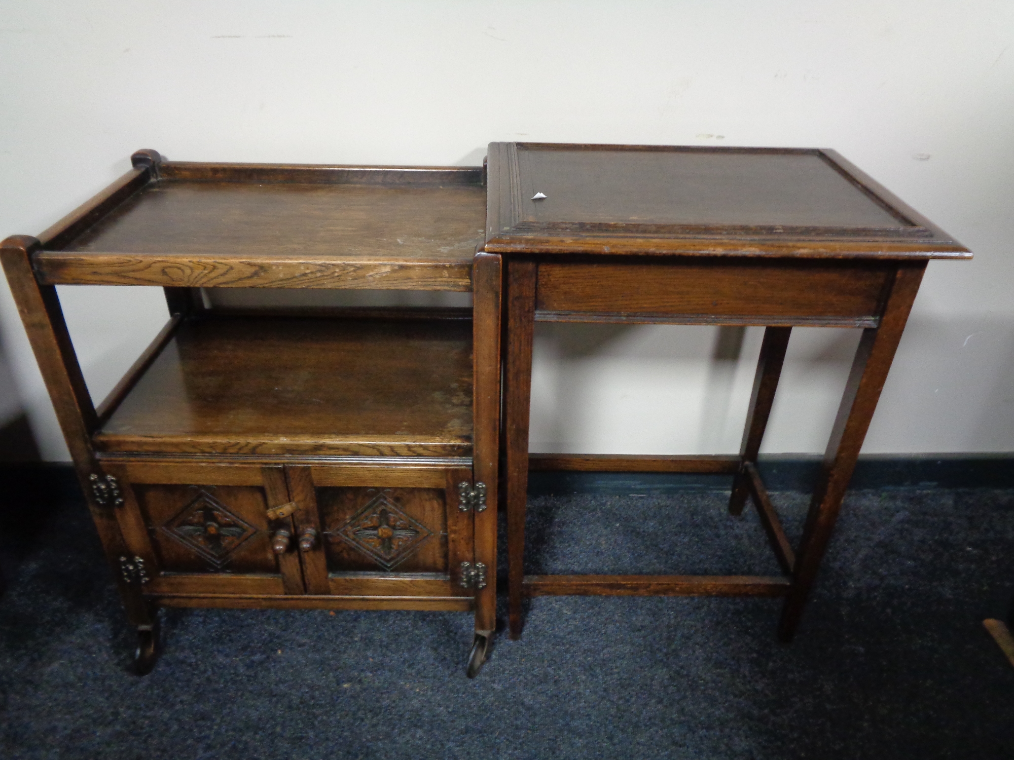 An Edwardian oak occasional table and a tea trolley