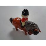 A John Beswick figure, girl in hunting outfit on pony.