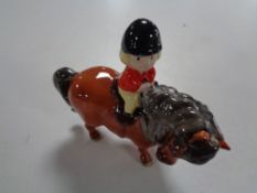 A John Beswick figure, girl in hunting outfit on pony.