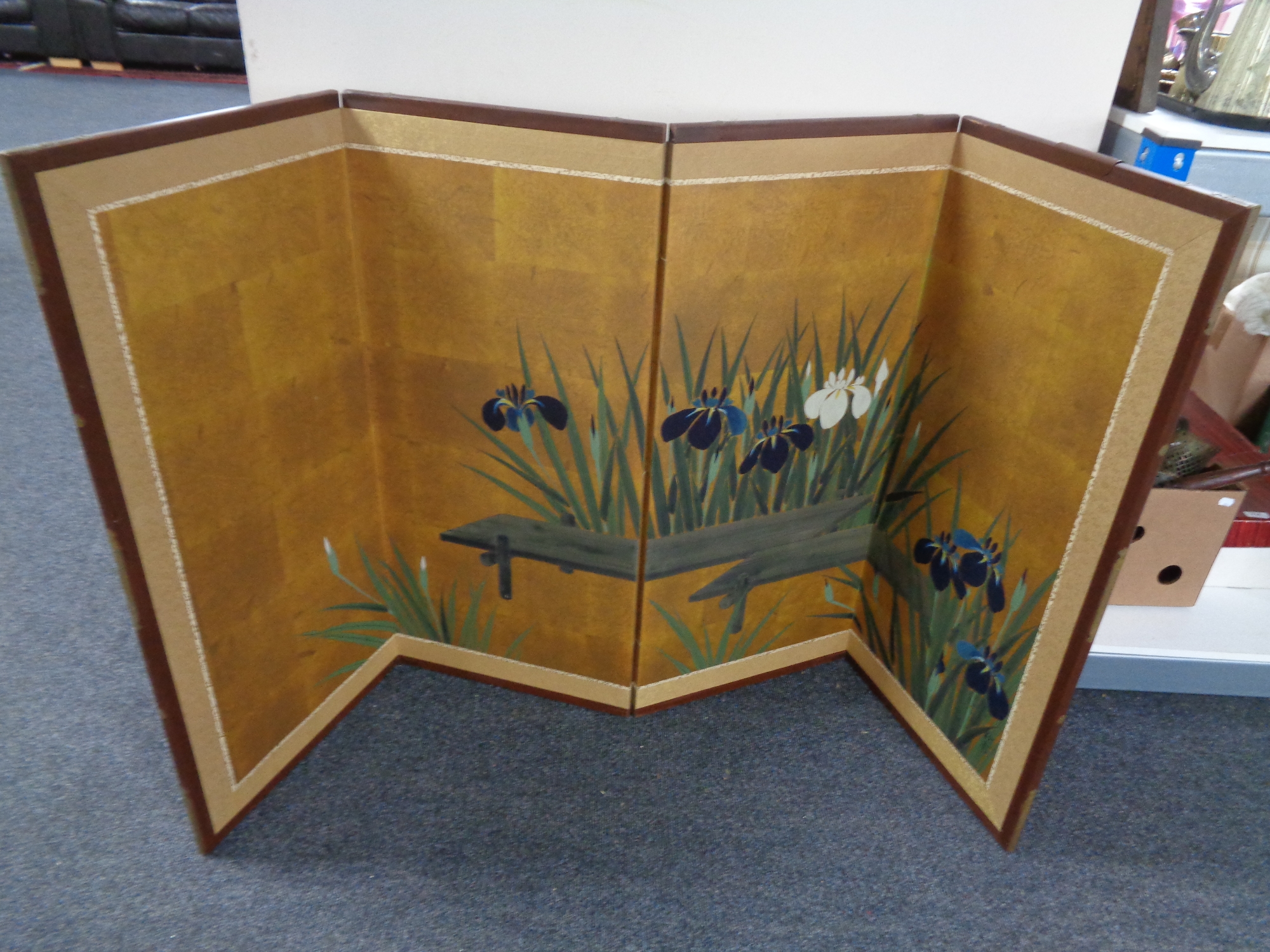 An oriental style four fold low screen