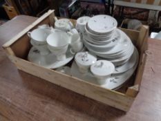 A box of German white floral pattern tea and dinner ware