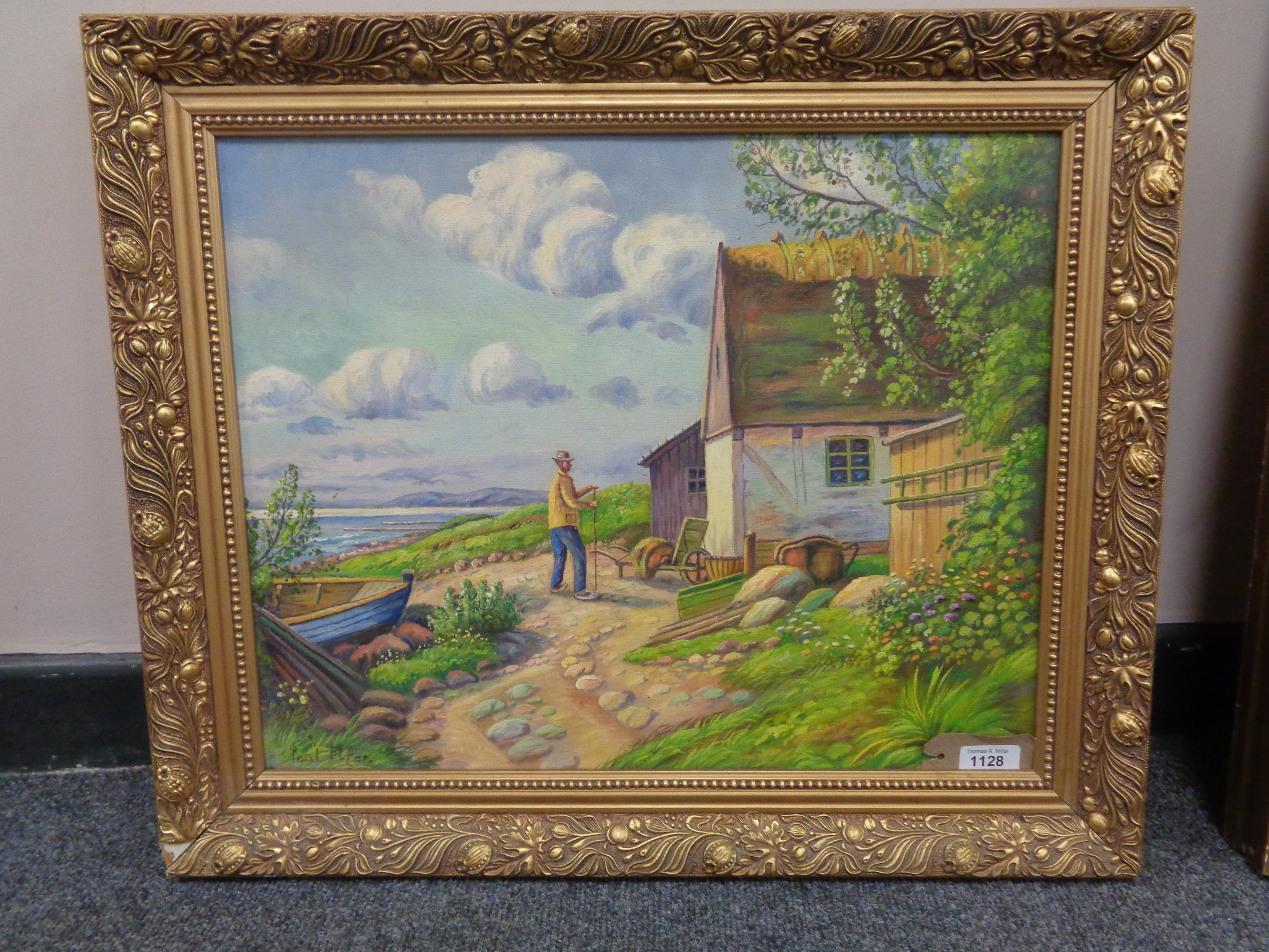 Continental school: Farmer by a thatched barn, oil on canvas, framed.