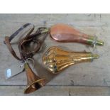 Two copper and brass powder flasks,