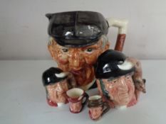 A large Suvesco character jug 'The Huntsman' together with four further small Royal Doulton