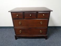 A Stag Minstrel five drawer chest