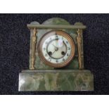 An onyx mantel clock with brass and enamel dial CONDITION REPORT: This has a