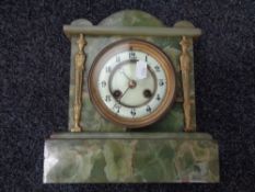 An onyx mantel clock with brass and enamel dial CONDITION REPORT: This has a