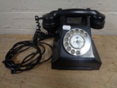 A vintage black Bakelite telephone