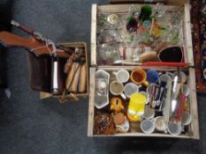 Two crates and a basket of glass ware, Disney mugs, cine camera, cutlery,