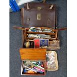 An antique mahogany box and a vintage leather case containing postcards, coin sets, leather satchel,