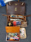 An antique mahogany box and a vintage leather case containing postcards, coin sets, leather satchel,