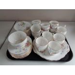 A tray of thirty-eight pieces of Queen Anne Old Country Spray tea china