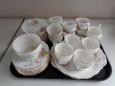 A tray of thirty-eight pieces of Queen Anne Old Country Spray tea china