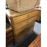 A late 19th century oak four drawer chest