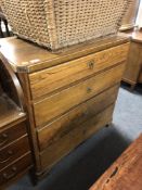 A late 19th century oak four drawer chest