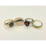 Four white metal dress rings