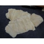 Three sheepskin rugs