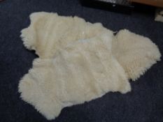 Three sheepskin rugs