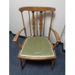 A beech spindle back armchair