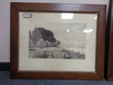 An early twentieth century monochrome print depicting marshland in an oak frame