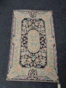 A Kashmiri hand stitched wool chain rug 120 cm x 73 cm