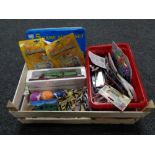 A box of toys to include trains, air craft, binoculars, toy money, games compendium,
