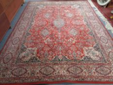 A machined Persian design rug 254 cm x 342 cm.