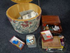 A mid 20th century sewing box together with a mahogany box containing sewing accessories, needles,